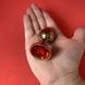 Золота анальна пробка з червоним кристалом (2,8 см) - фото товару
