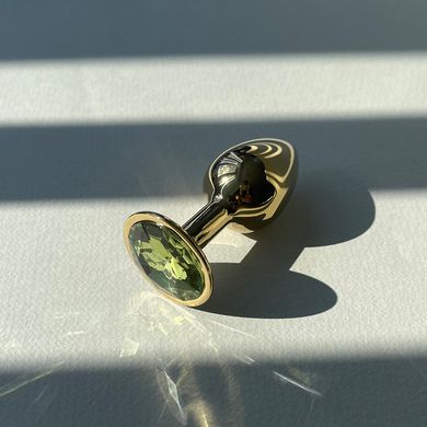 Золота анальна пробка з салатовим кристалом (2,8 см) - фото