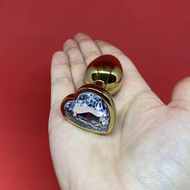 Золота анальна пробка сердечко з білим кристалом (2,8 см) - фото